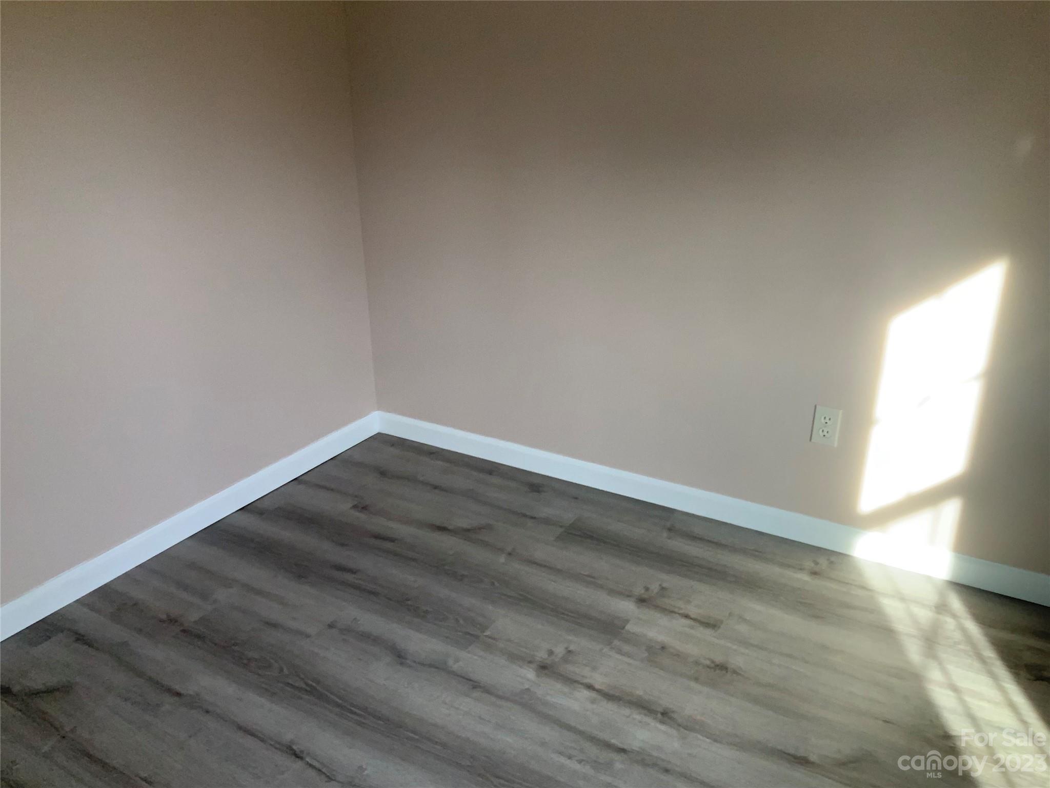 2240 Pace Road Hendersonville, NC 28792 - Photo 14 of 23 wooden floor in an empty room