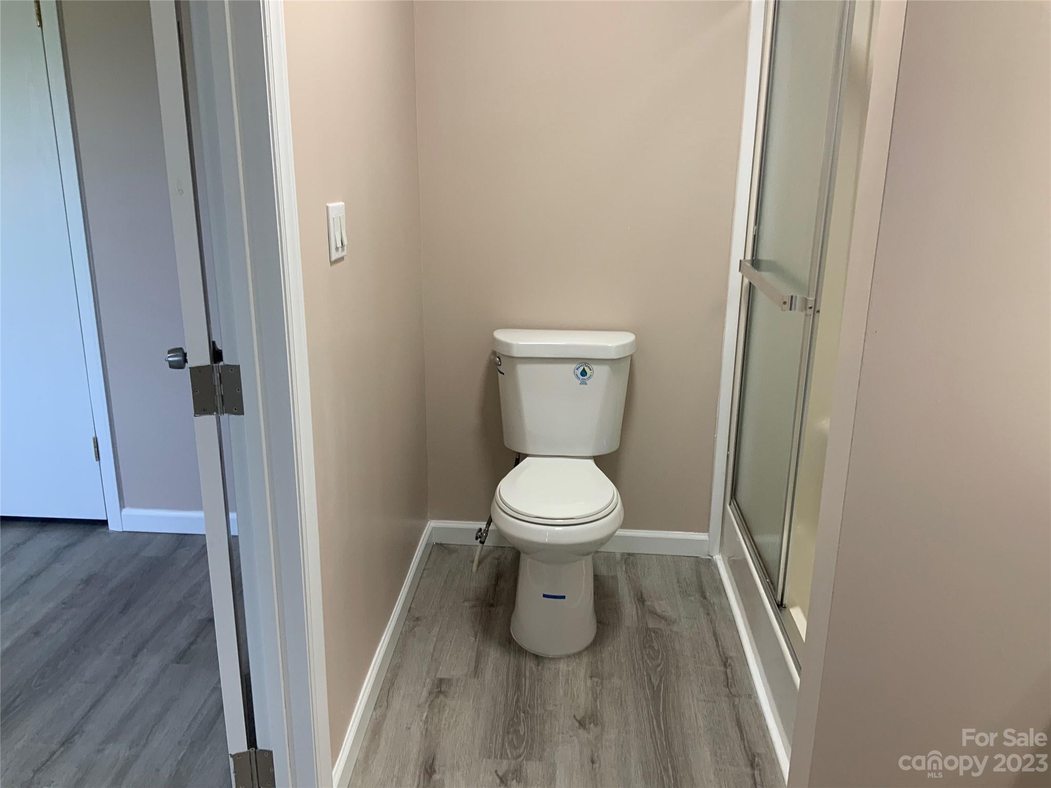 2240 Pace Road Hendersonville, NC 28792 - Photo 20 of 23 a bathroom with a toilet and a shower
