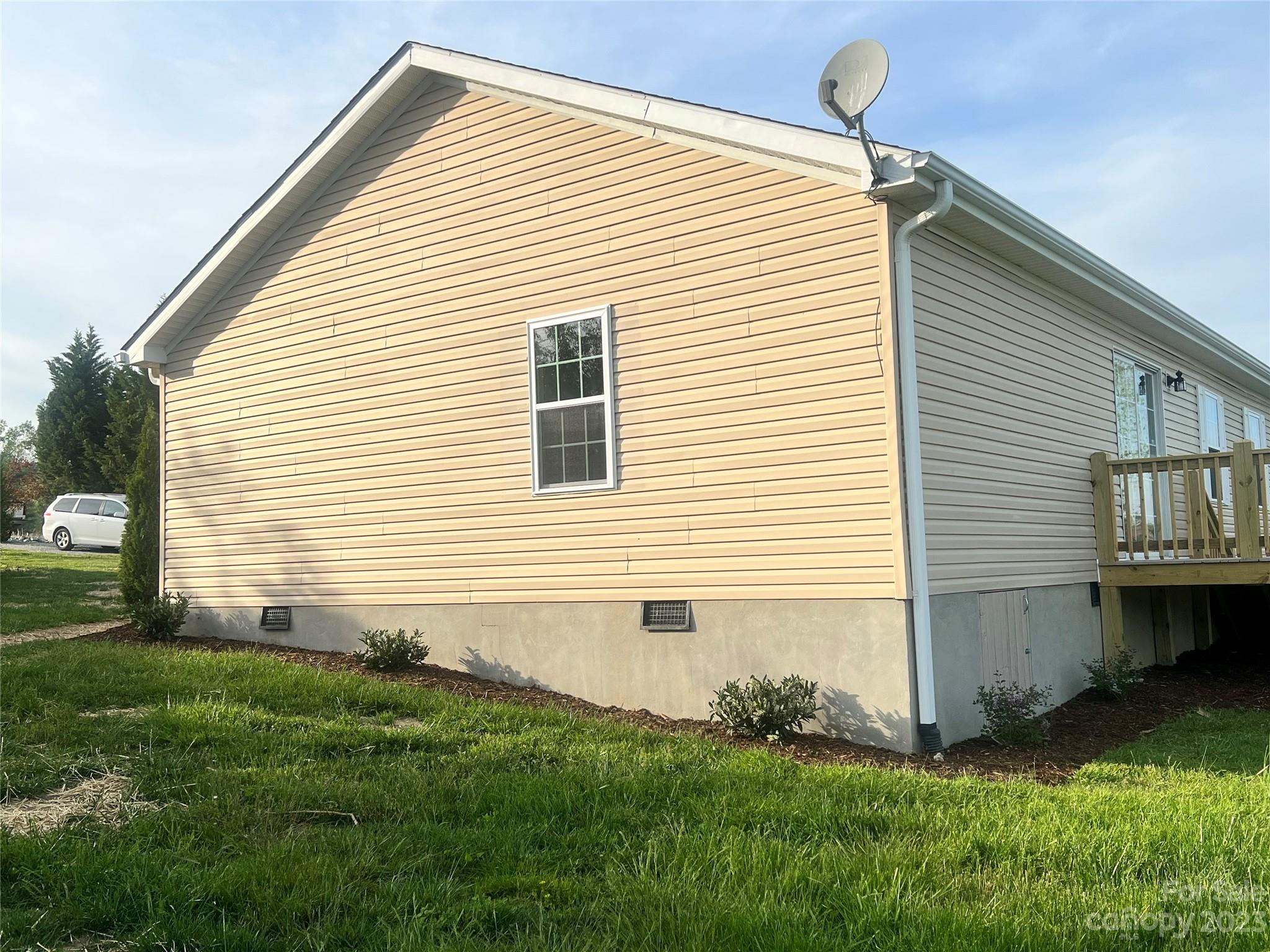 2240 Pace Road Hendersonville, NC 28792 - Photo 21 of 23 a view of backyard with barbeque grill and a wooden fence