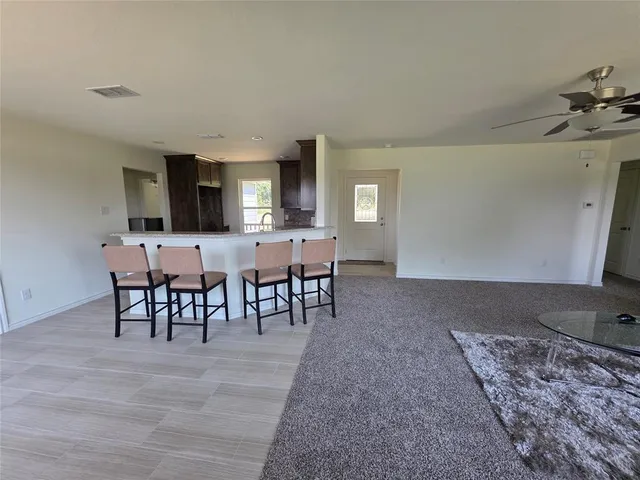 a front view of a house with yard