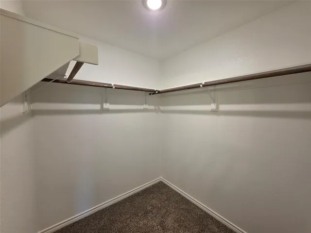 a white bath tub sitting in a bathroom