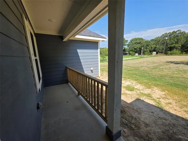 a view of a livingroom with a window
