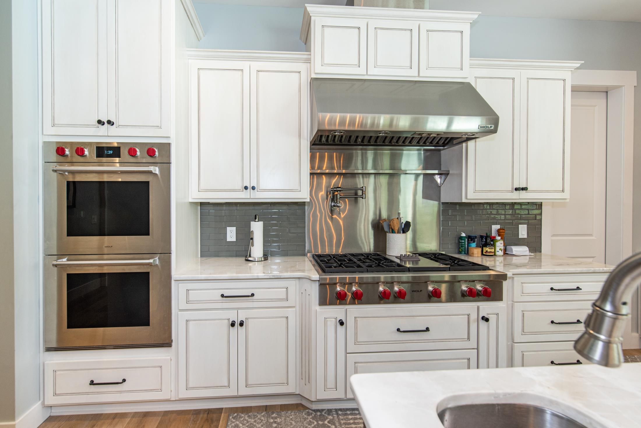 1015 Poinsettia Road St. Augustine, FL 32086 - Photo 12 of 50 a kitchen with stainless steel appliances a stove and cabinets