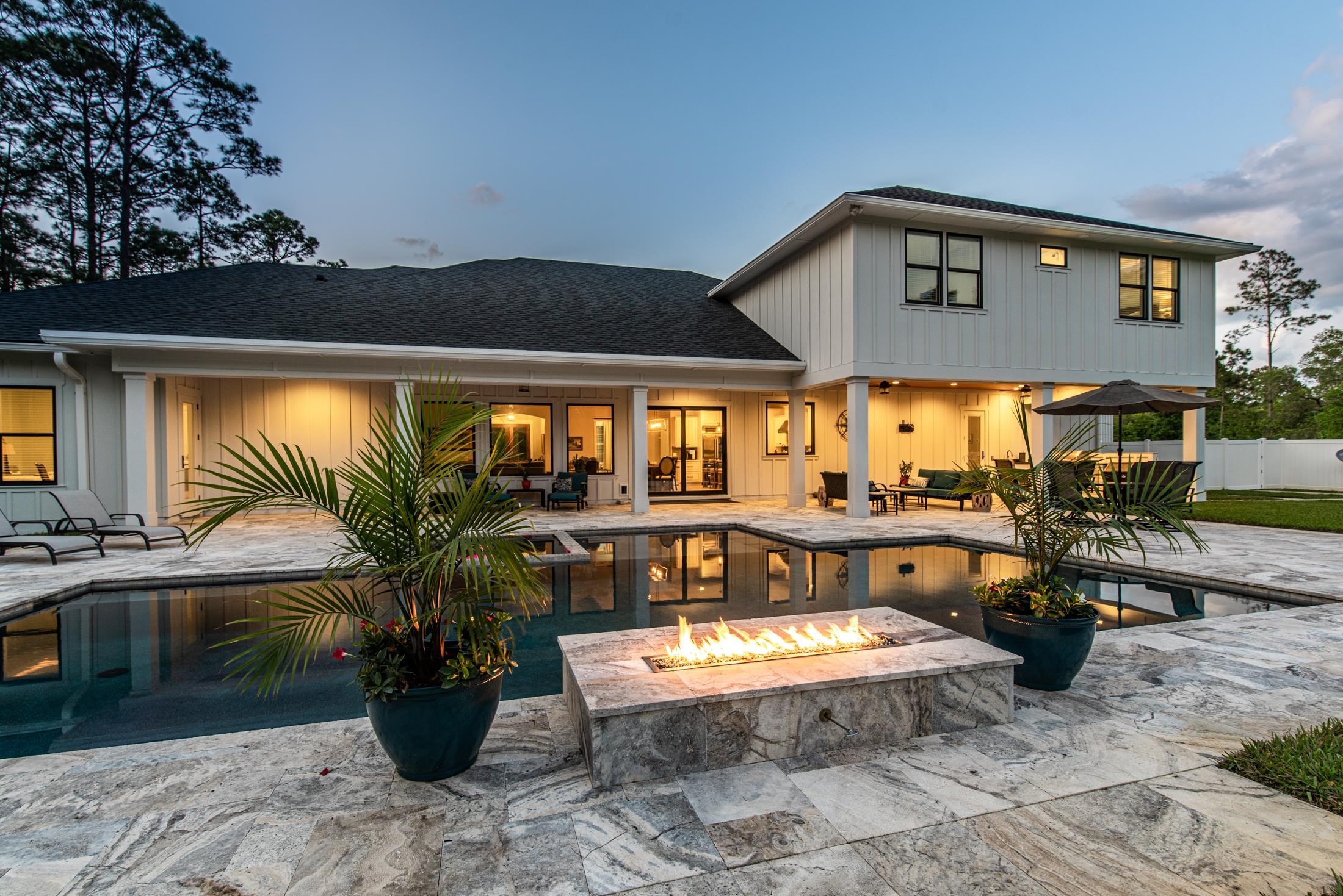 1015 Poinsettia Road St. Augustine, FL 32086 - Photo 2 of 50 a outdoor space with a large pool and furniture