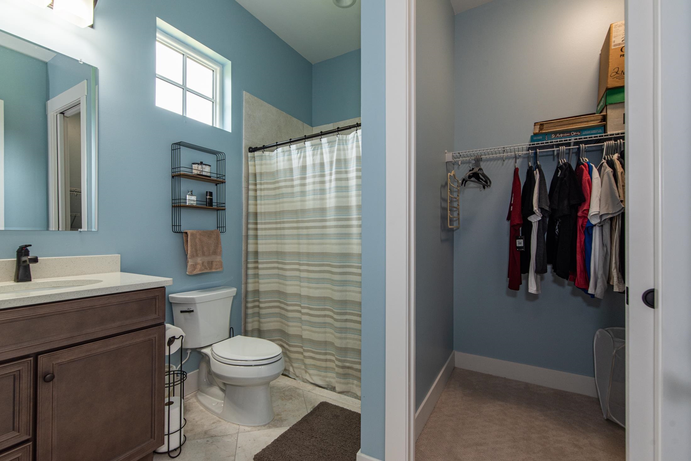 1015 Poinsettia Road St. Augustine, FL 32086 - Photo 24 of 50 a bathroom with a toilet sink and shower