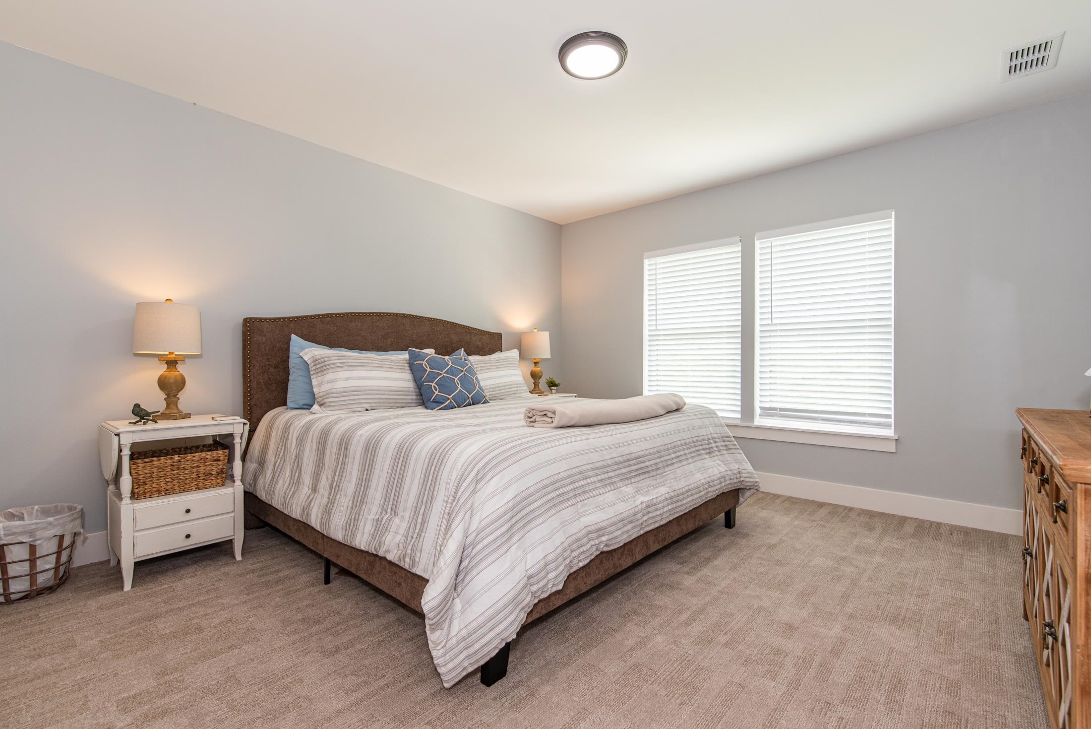 1015 Poinsettia Road St. Augustine, FL 32086 - Photo 29 of 50 a bedroom with a bed and a window