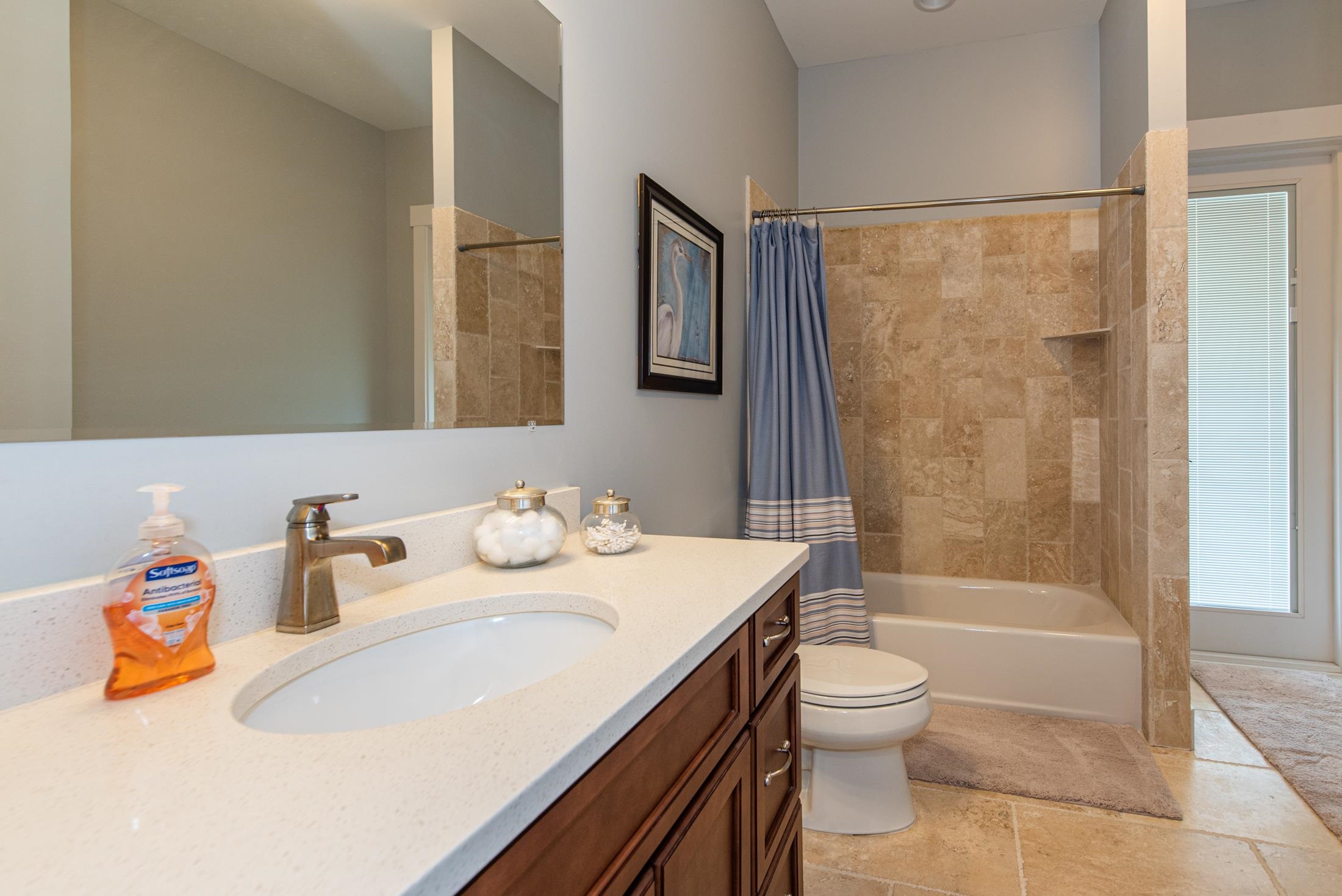 1015 Poinsettia Road St. Augustine, FL 32086 - Photo 31 of 50 a bathroom with a sink a toilet and shower