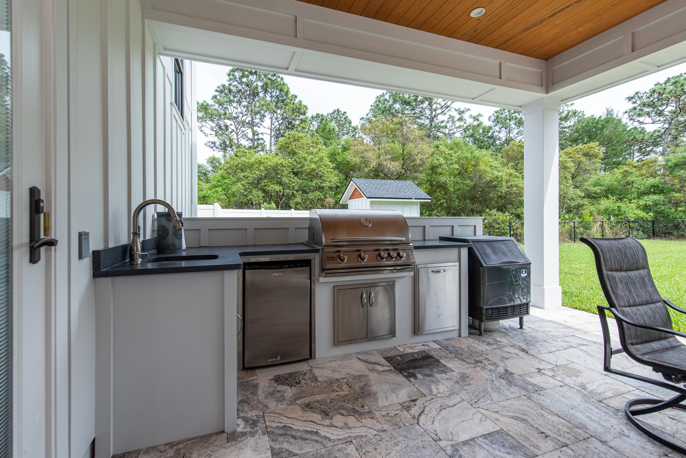 1015 Poinsettia Road St. Augustine, FL 32086 - Photo 43 of 50 a kitchen with a stove a sink and a refrigerator