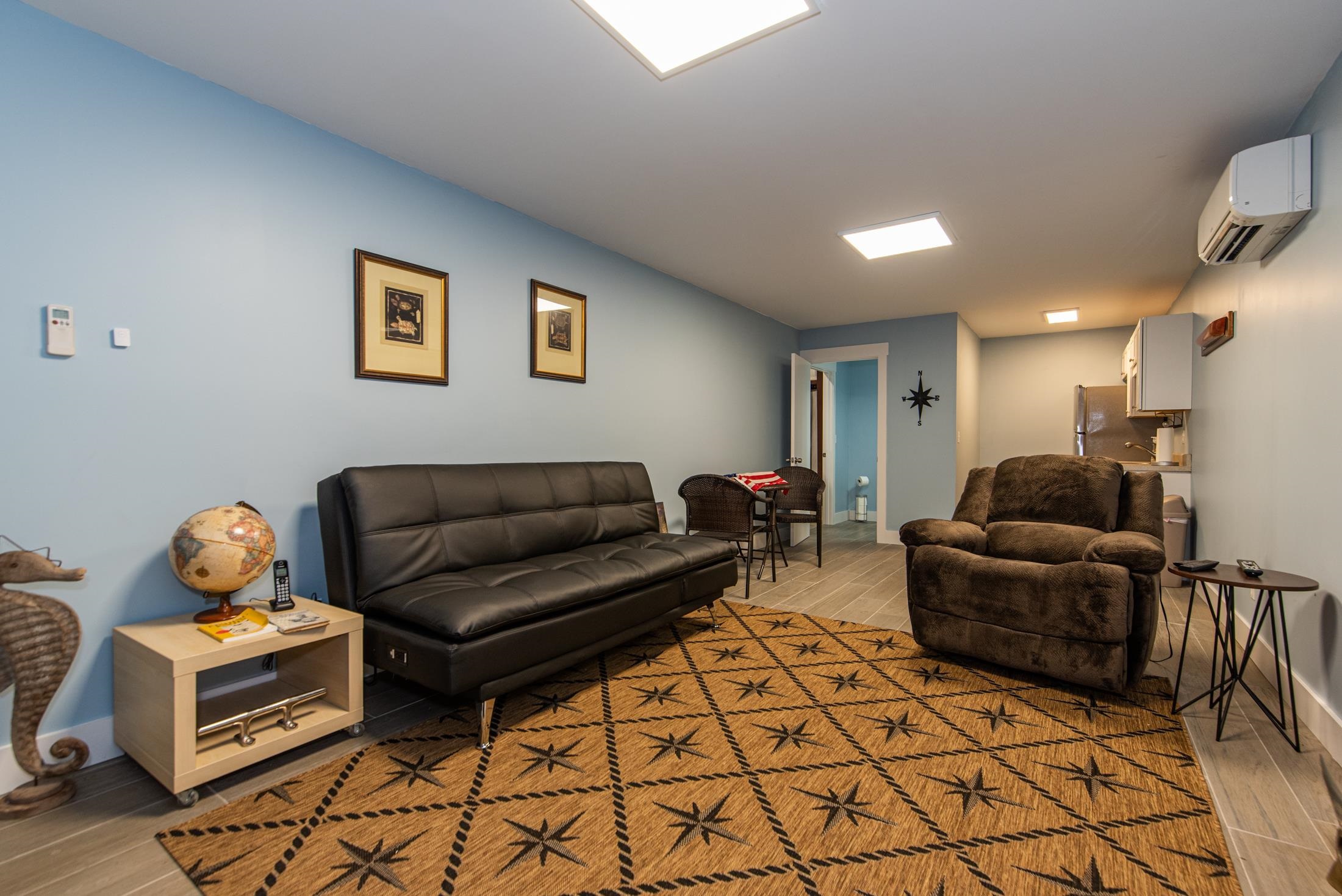 1015 Poinsettia Road St. Augustine, FL 32086 - Photo 49 of 50 a living room with furniture and a couch