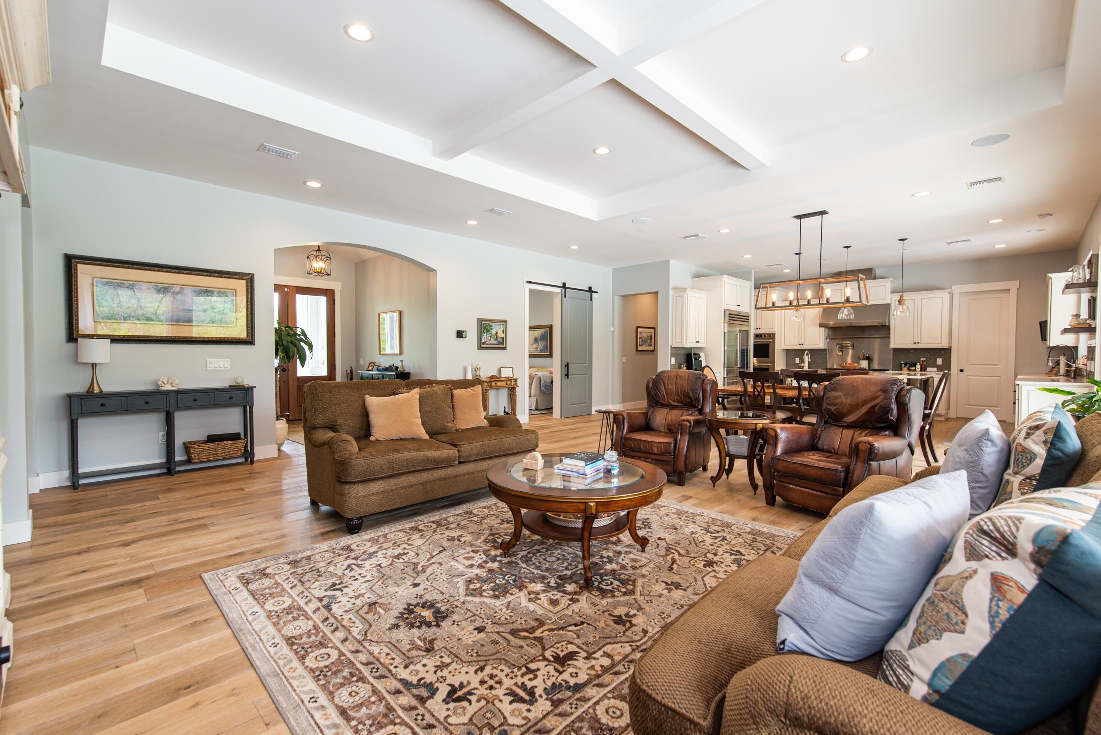 1015 Poinsettia Road St. Augustine, FL 32086 - Photo 9 of 50 a living room with furniture kitchen view and a table