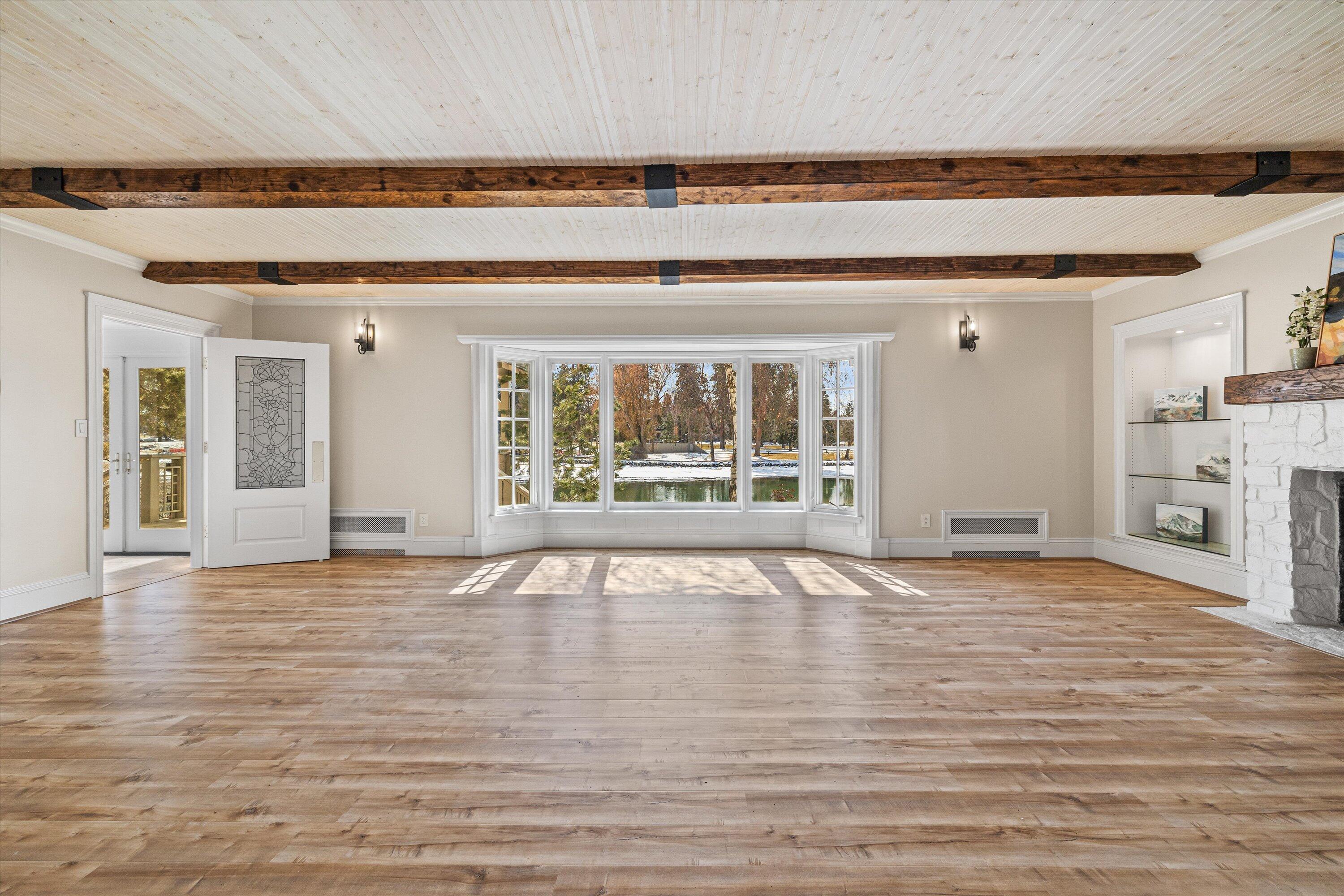 437 Northwest Drake Road Bend, OR 97703 - Photo 14 of 86 a view of an empty room with a window