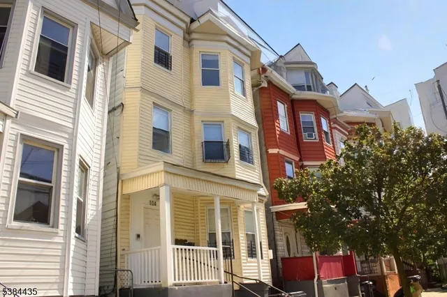 a front view of a multi story residential apartment building