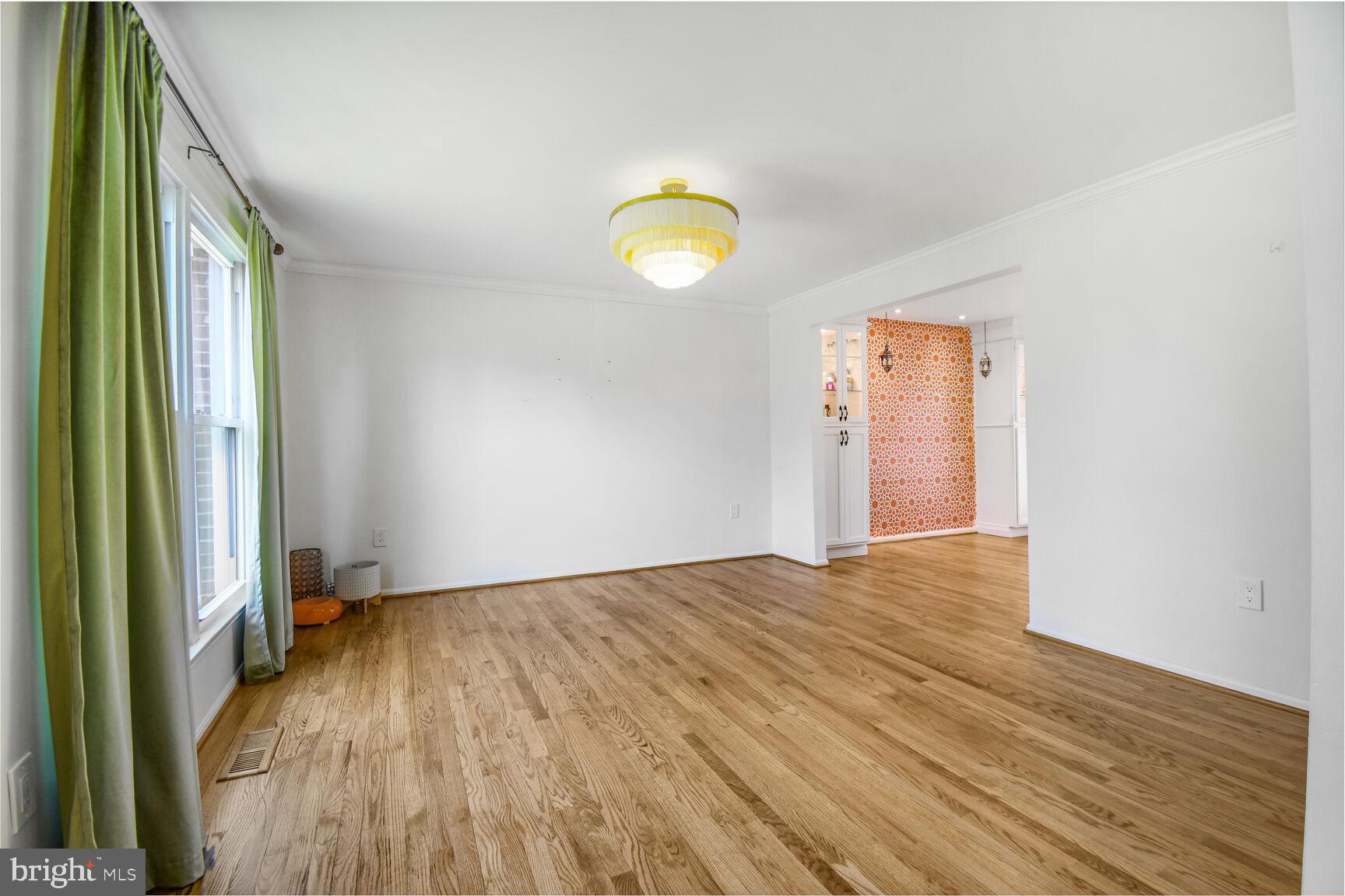 15320 Baileys Lane Silver Spring, MD 20906 - Photo 17 of 28 a view of a room with wooden floor and window
