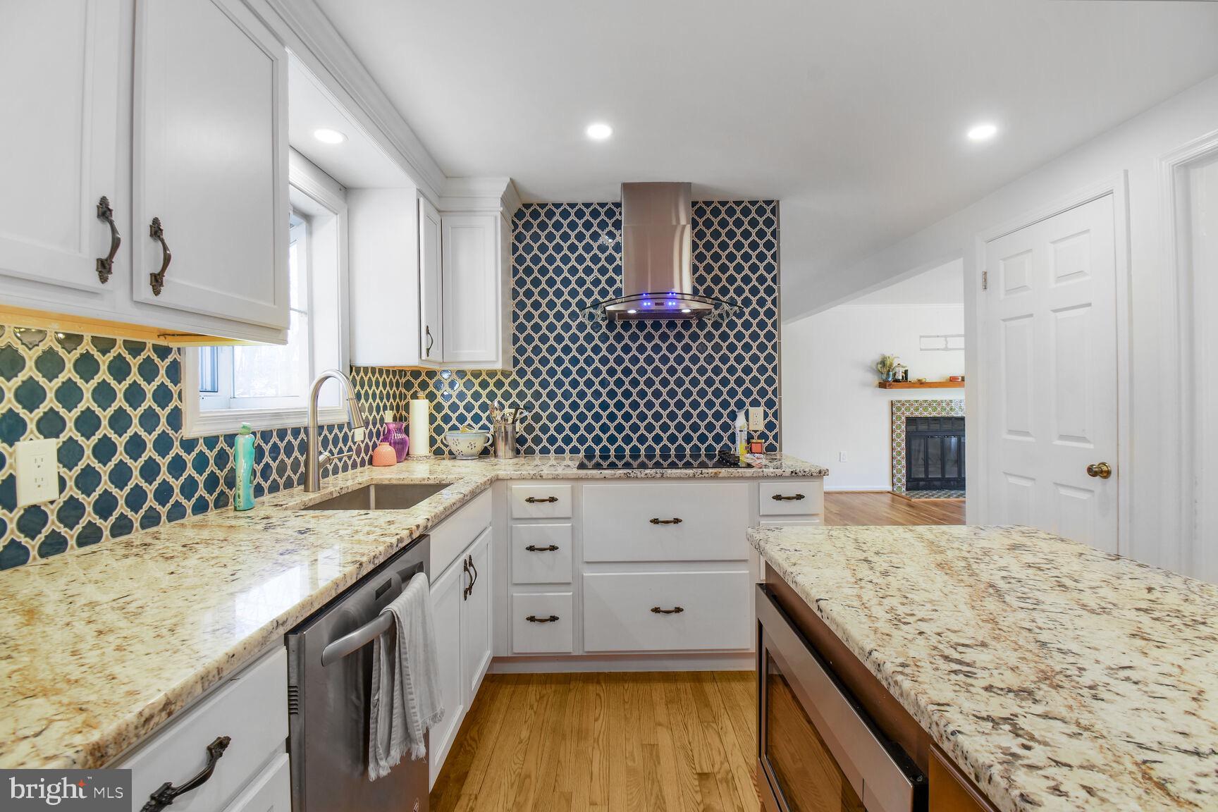 15320 Baileys Lane Silver Spring, MD 20906 - Photo 9 of 28 a kitchen with a sink stove and refrigerator