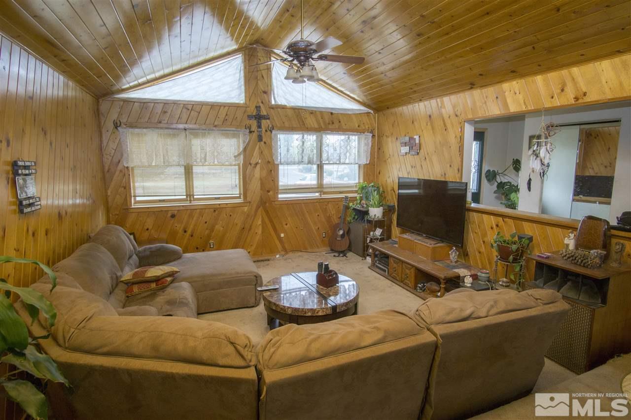 3106 Bottom Road Fallon, NV 89406 - Photo 7 of 16 a living room with furniture and a flat screen tv