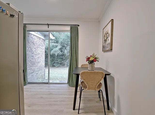 a workspace with furniture and a window