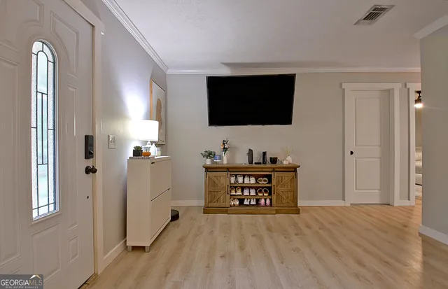 a view of workspace with wooden floor