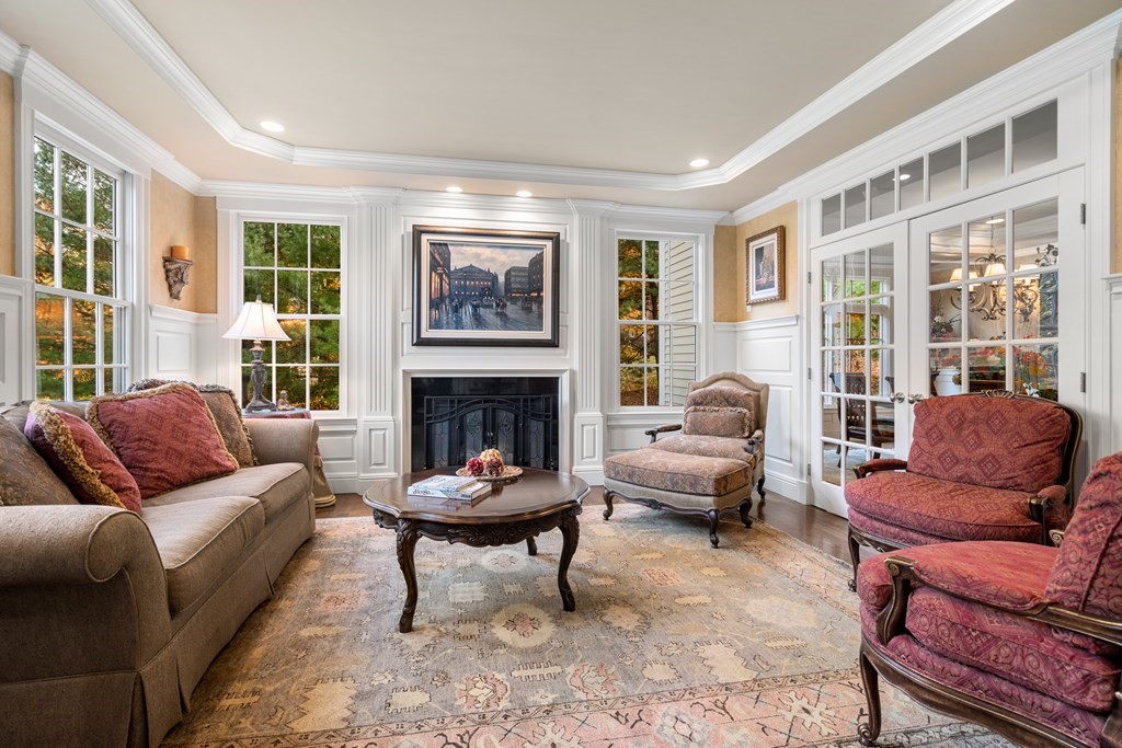 195 Plympton Road Sudbury, MA 01776 - Photo 5 of 25 a living room with furniture and a fireplace