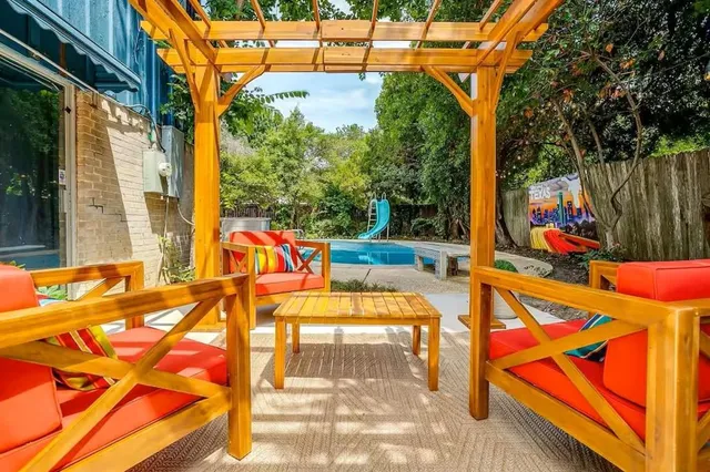 a view of a swimming pool with a sitting space