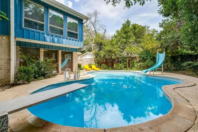 a view of outdoor space swimming pool and deck