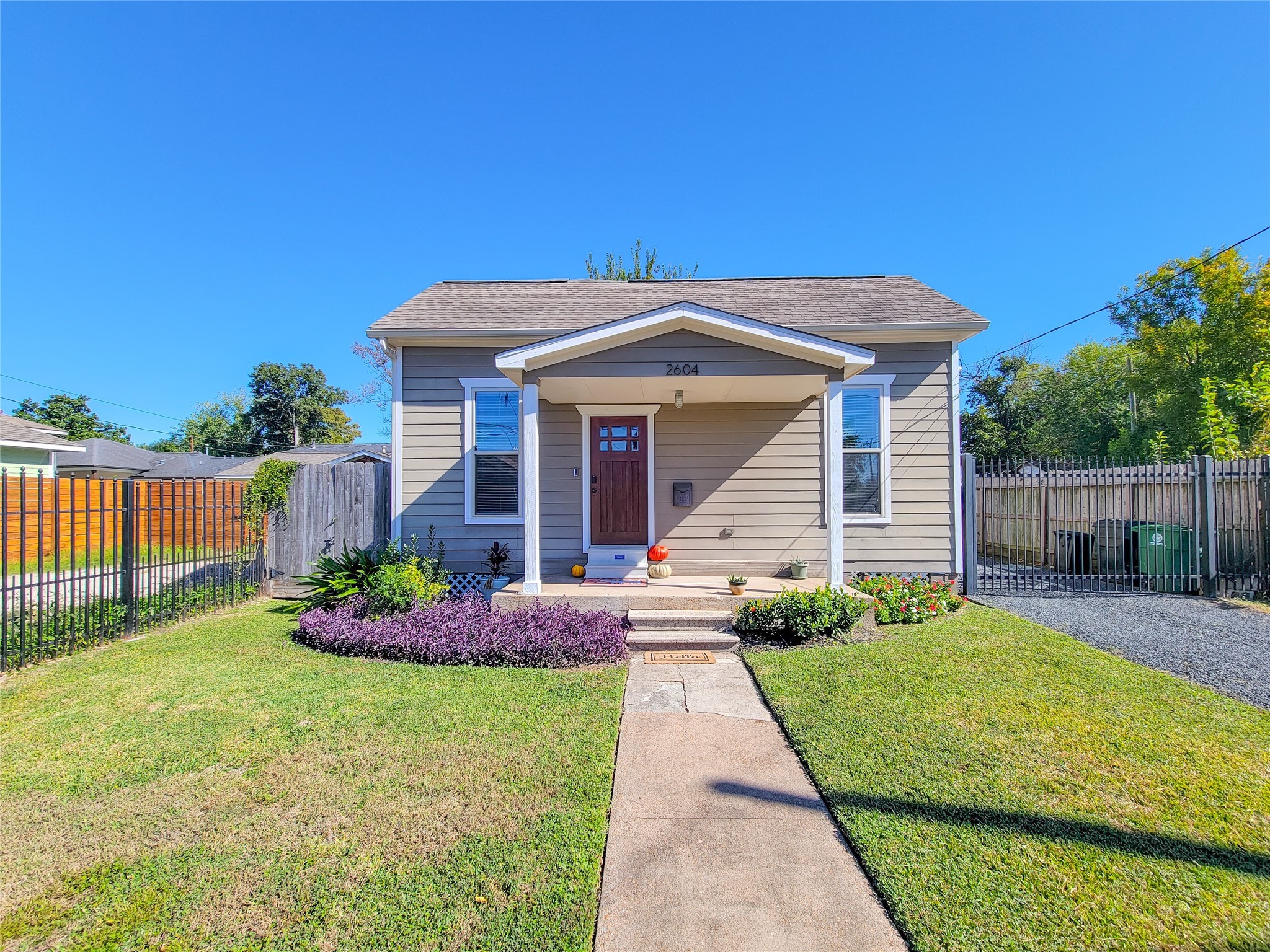 2604 Cochran Street Houston, TX 77009 - Photo 2 of 35 a front view of a house with garden