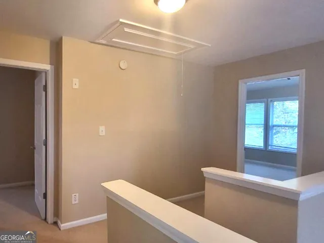 a view of an entryway with a window