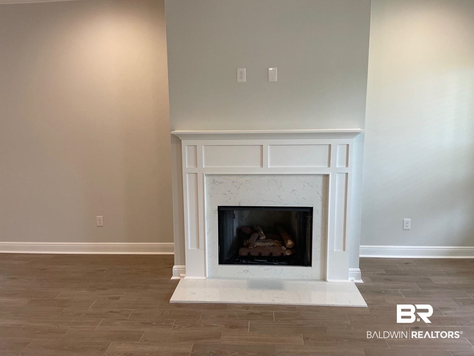1626 Fenton Circle Foley, AL 36535 - Photo 5 of 16 Room details featuring hardwood / wood-style flooring and a high end fireplace