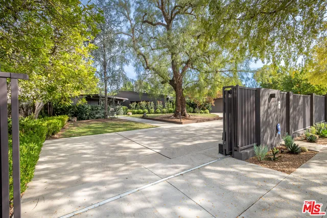 a view of backyard with green space