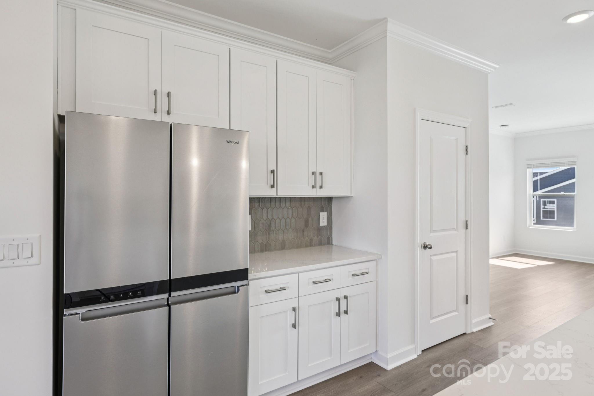 151 Kona Lane Fort Mill, SC 29708 - Photo 11 of 30 a white refrigerator freezer sitting in a kitchen
