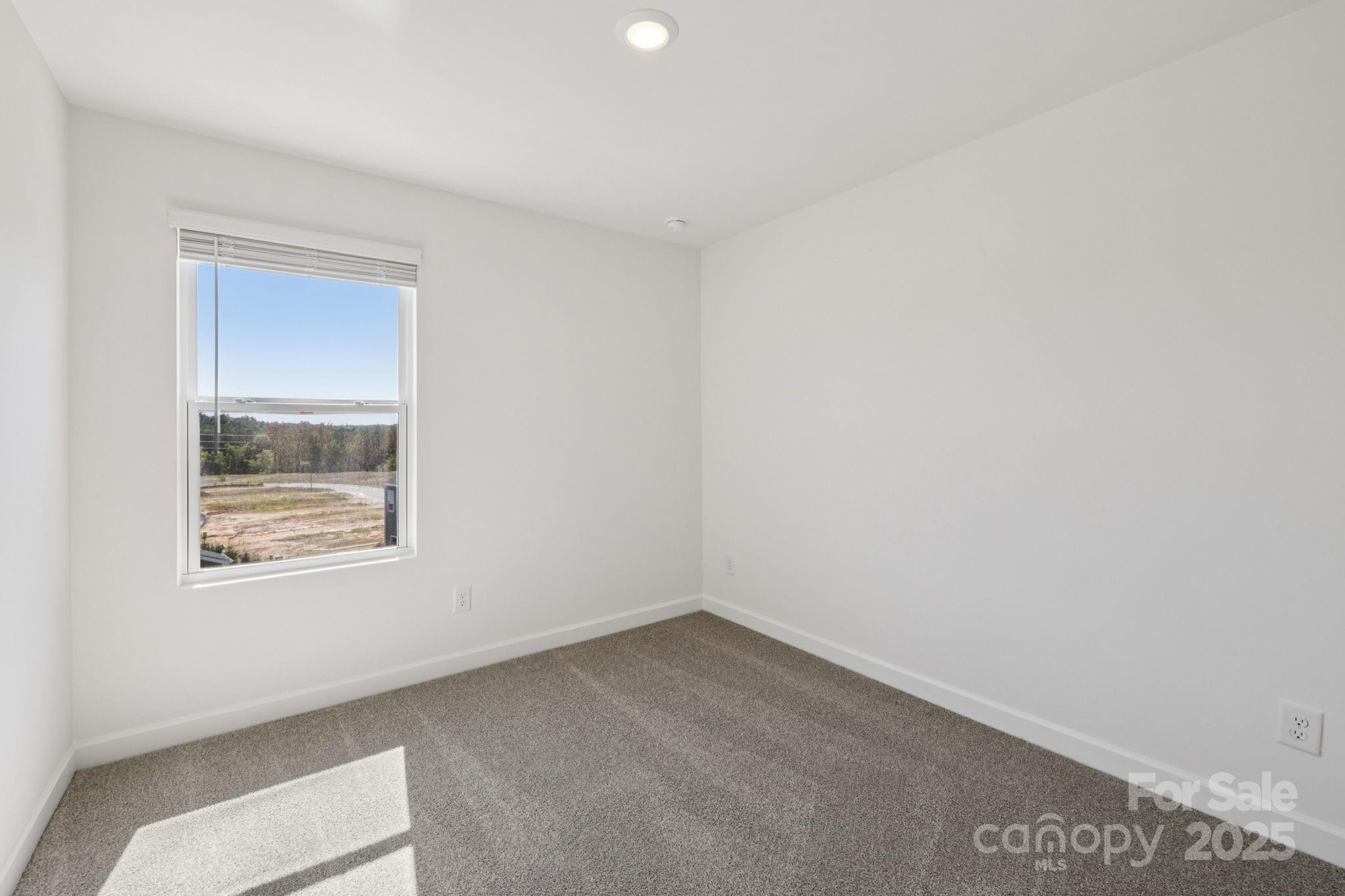 151 Kona Lane Fort Mill, SC 29708 - Photo 18 of 30 an empty room with a window