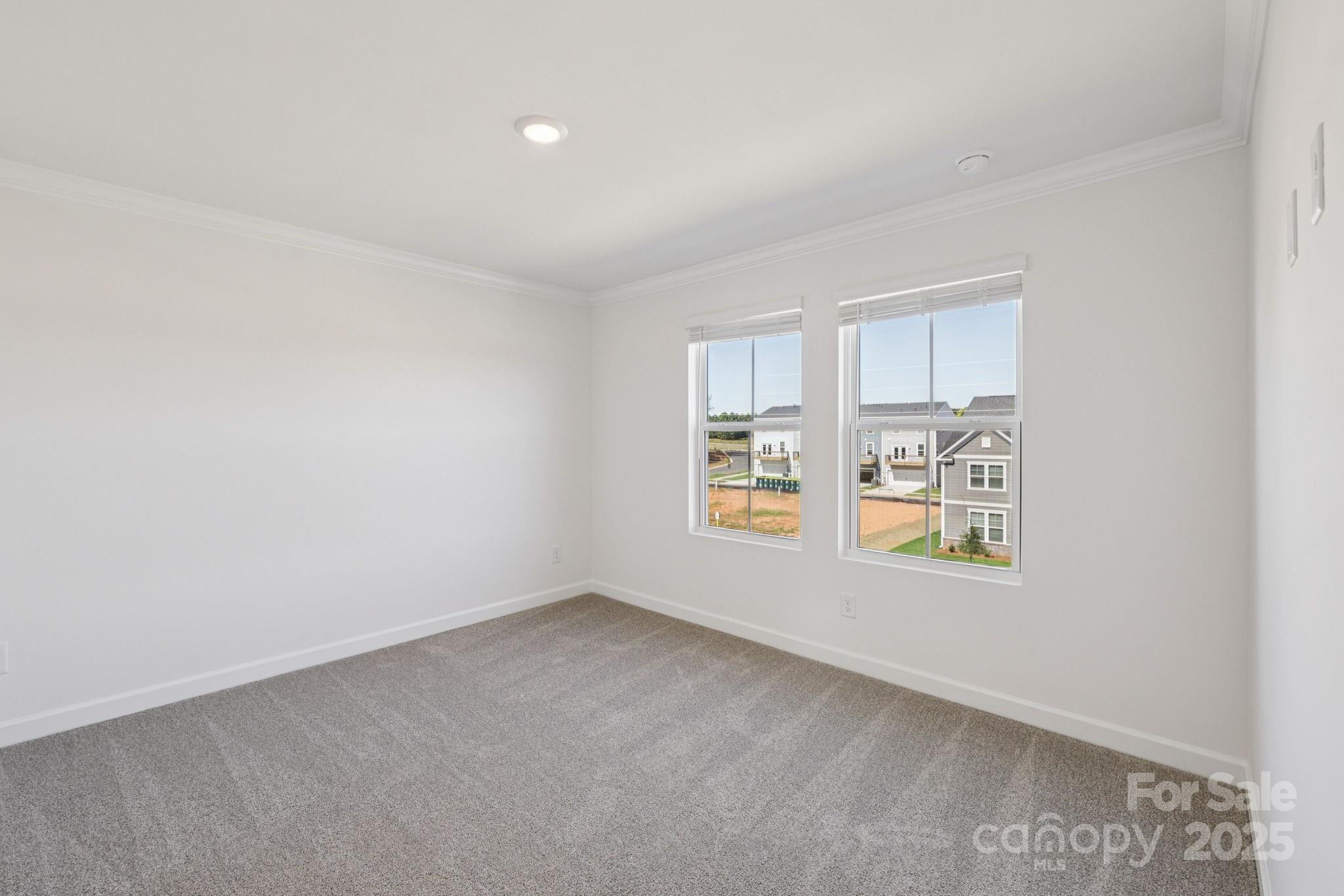 151 Kona Lane Fort Mill, SC 29708 - Photo 19 of 30 an empty room with windows
