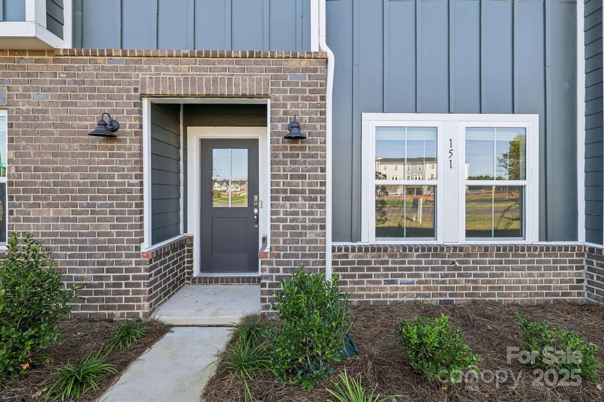 151 Kona Lane Fort Mill, SC 29708 - Photo 2 of 30 a front view of a house with a yard