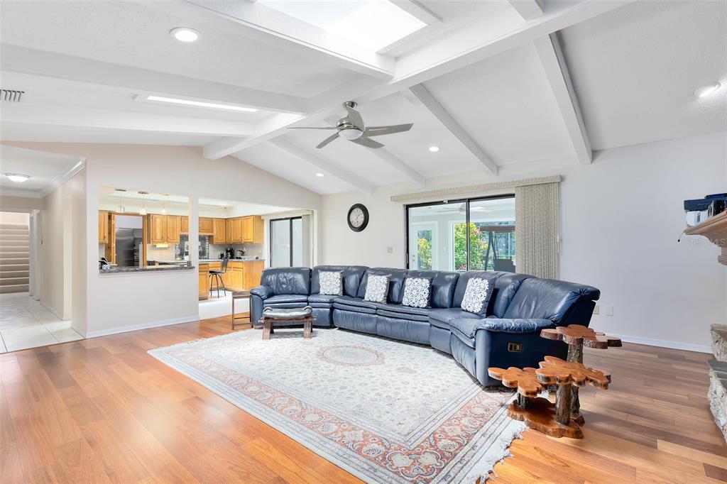 111 Variety Tree Circle Altamonte Springs, FL 32714 - Photo 5 of 35 Your spacious family room features a stunning vaulted ceiling, giving an open and airy feel to the space.