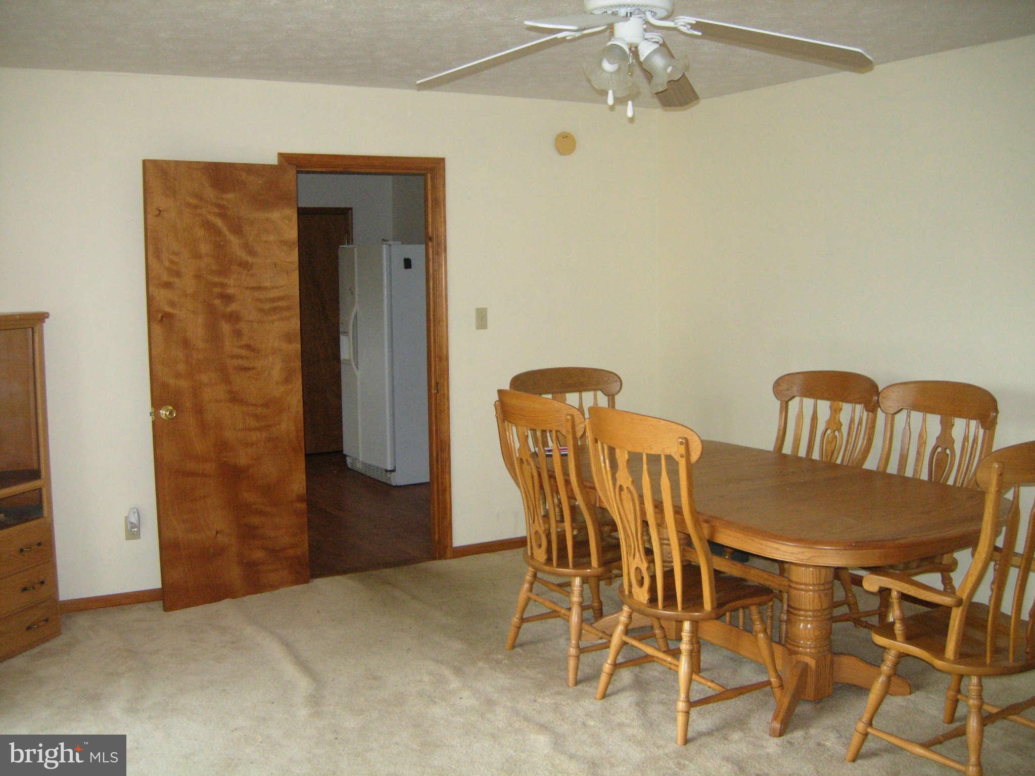 137 Nellies Corner Road Rising Sun, MD 21911 - Photo 6 of 11 Dining Room with sliders to outside