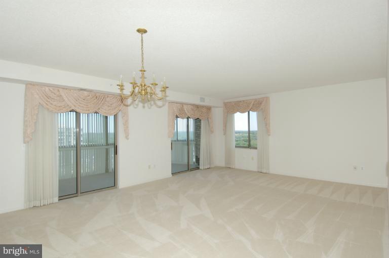 19375 Cypress Ridge Terrace, Unit 1007 Leesburg, VA 20176 - Photo 3 of 19 a view of a chandelier in a room