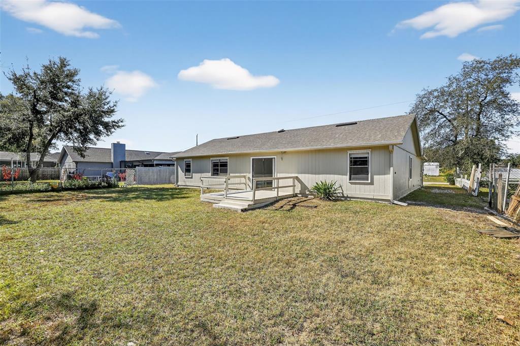 2737 East Dorchester Drive Deltona, FL 32738 - Photo 32 of 32 a swimming pool view with a seating space