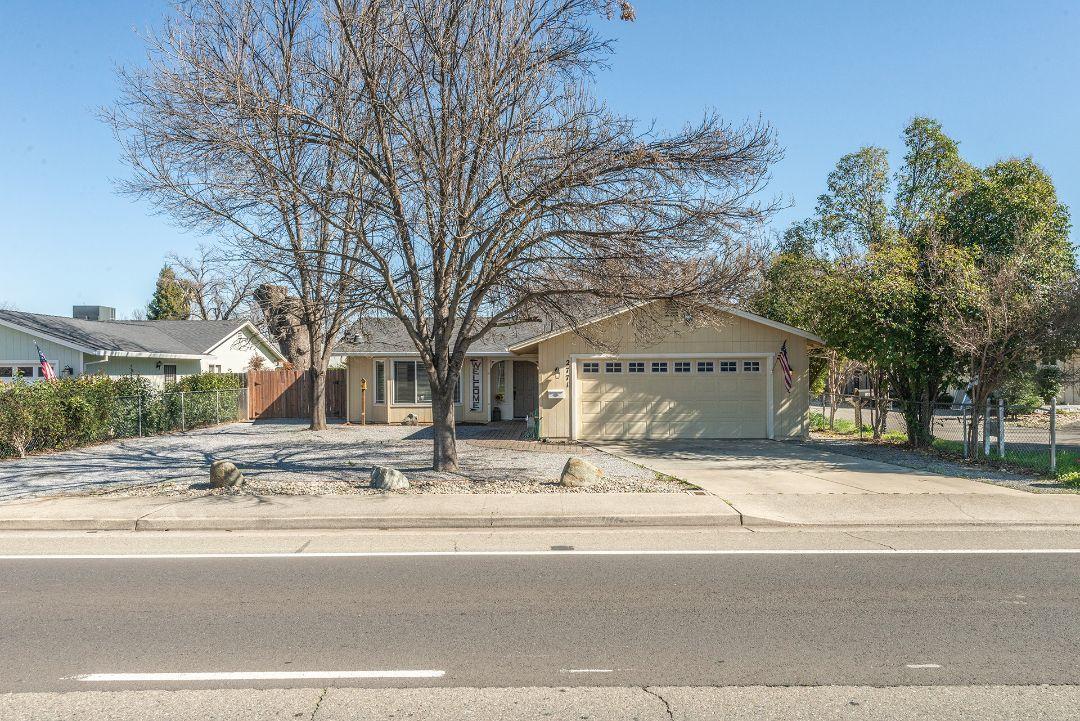 a view of street with a house