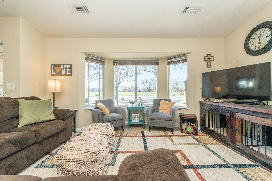2771 North Street Anderson, CA 96007 - Photo 11 of 55 a living room with furniture and a flat screen tv