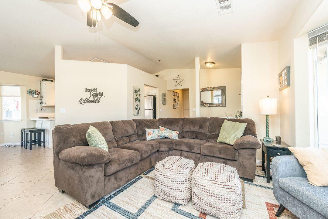 2771 North Street Anderson, CA 96007 - Photo 13 of 55 a living room with furniture and a large mirror