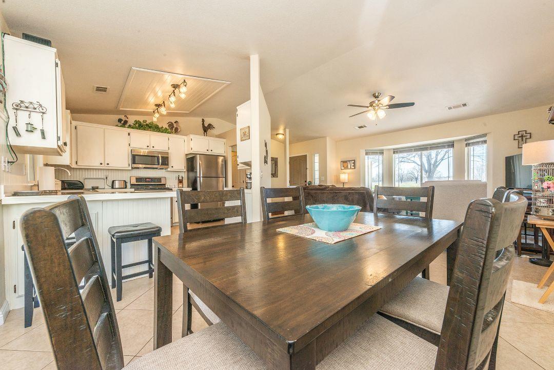 2771 North Street Anderson, CA 96007 - Photo 17 of 55 a dining room with stainless steel appliances furniture stove and kitchen view