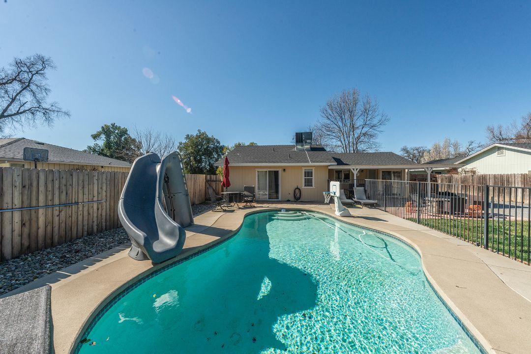 2771 North Street Anderson, CA 96007 - Photo 2 of 55 a view of a house with backyard and sitting area