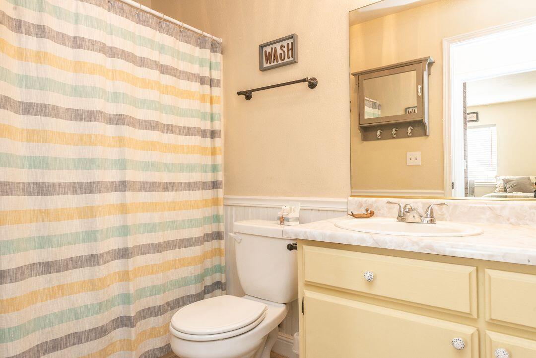 2771 North Street Anderson, CA 96007 - Photo 28 of 55 a bathroom with a sink toilet and shower