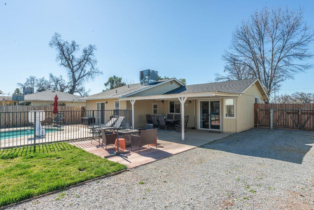 2771 North Street Anderson, CA 96007 - Photo 35 of 55 a view of a house with backyard and sitting area