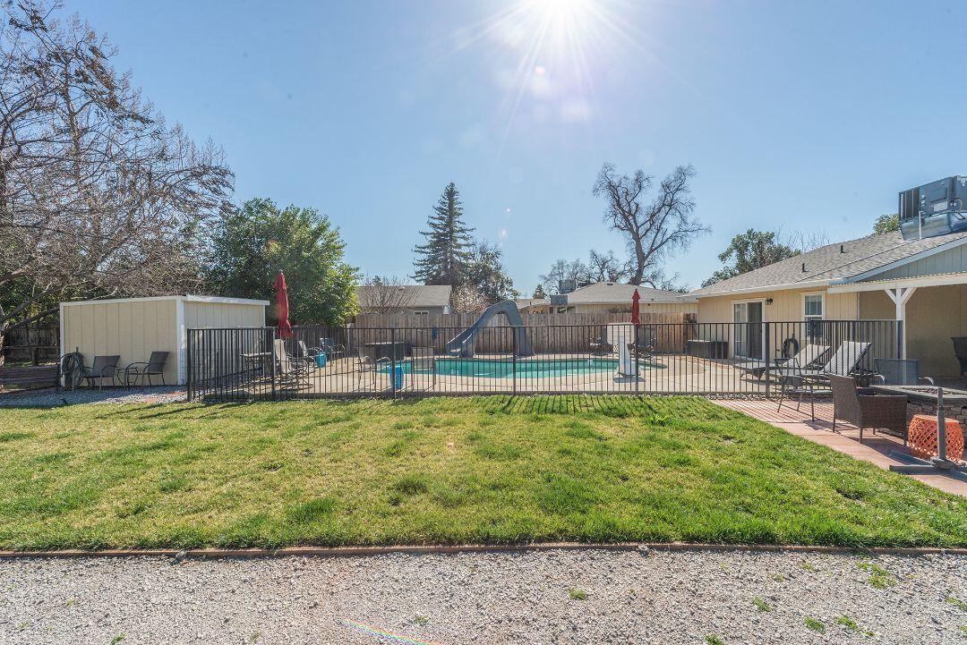 2771 North Street Anderson, CA 96007 - Photo 42 of 55 a view of a swimming pool with a patio