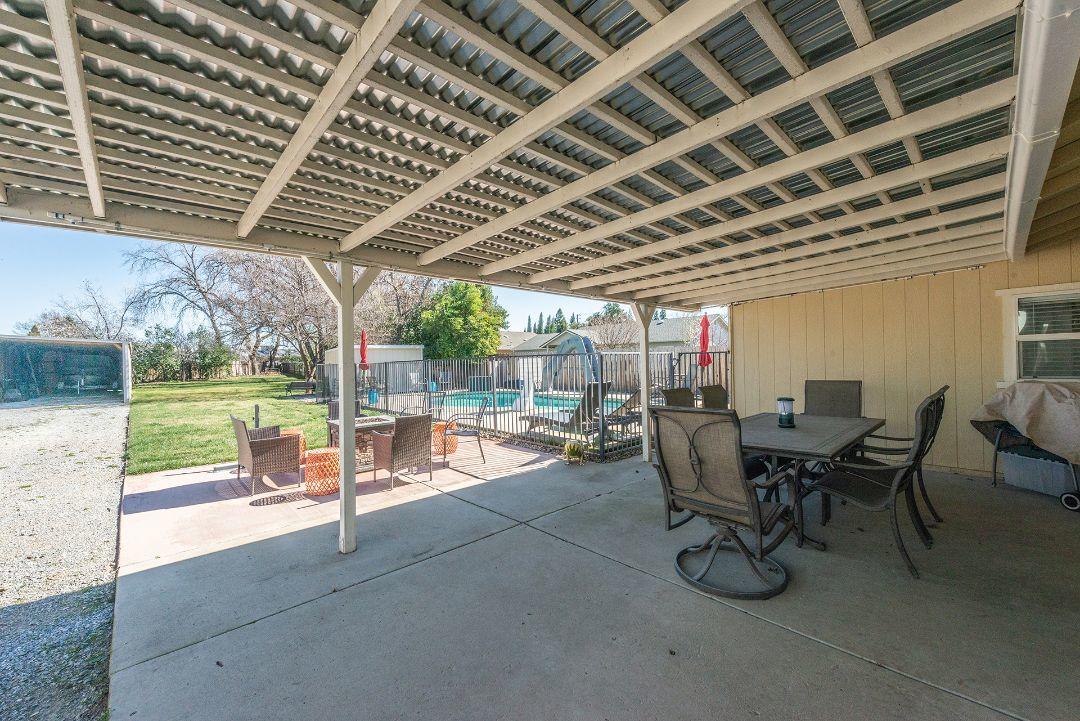 2771 North Street Anderson, CA 96007 - Photo 43 of 55 a view of a patio with a table and chairs