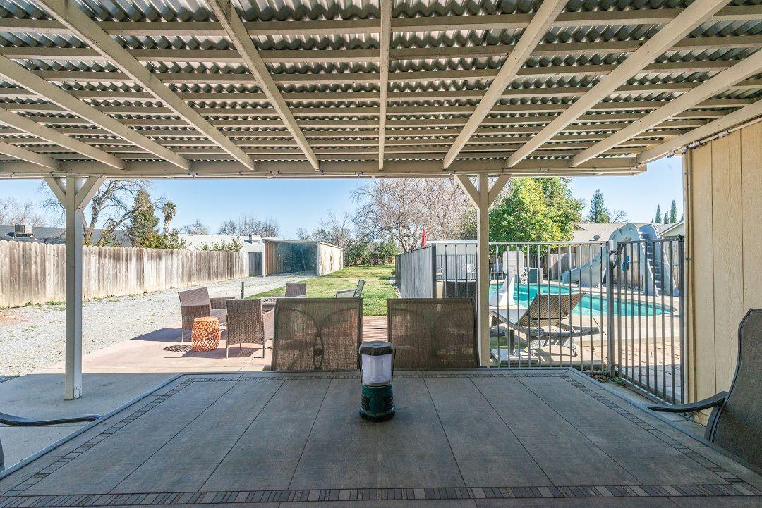 2771 North Street Anderson, CA 96007 - Photo 44 of 55 a room with wooden floors and glass windows