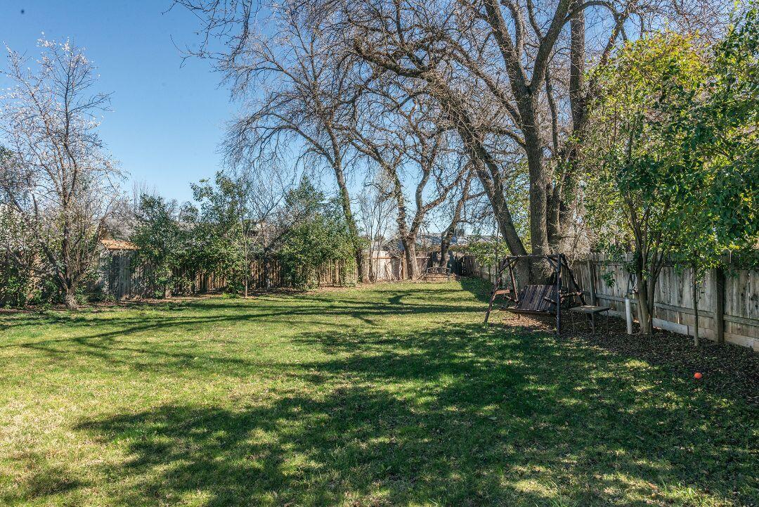 2771 North Street Anderson, CA 96007 - Photo 52 of 55 a big yard with lots of green space and trees