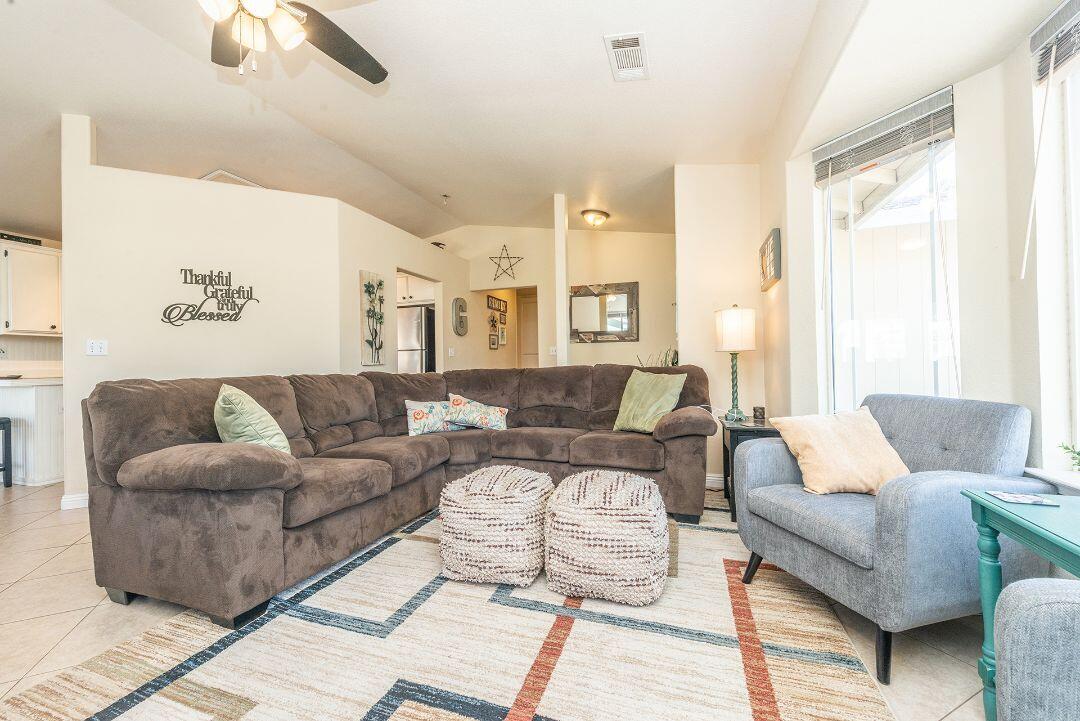 2771 North Street Anderson, CA 96007 - Photo 9 of 55 a living room with furniture and a large window