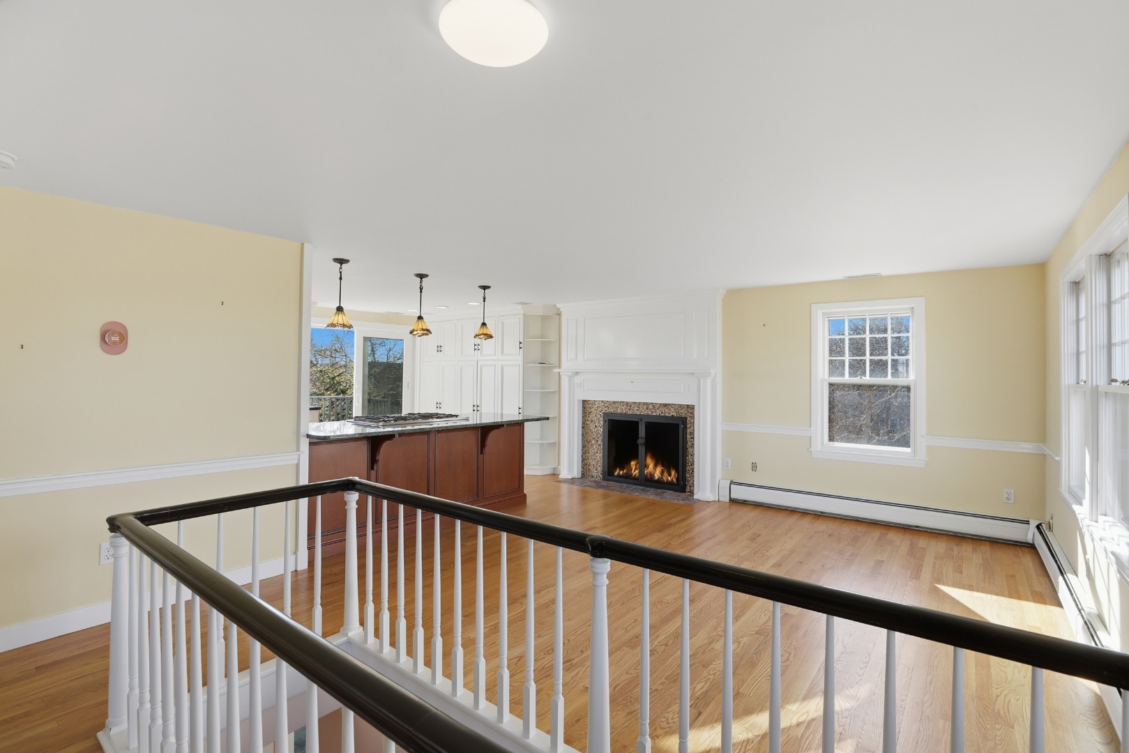 31 Flintlock Road Nantucket, MA 02554 - Photo 4 of 23 a view of an empty room with wooden floor and a window