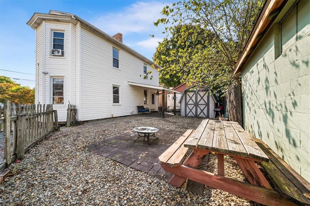 216 6th Street Monaca, PA 15061 - Photo 23 of 31 a view of a house with backyard and sitting area